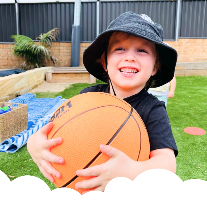 Boy holding basketball